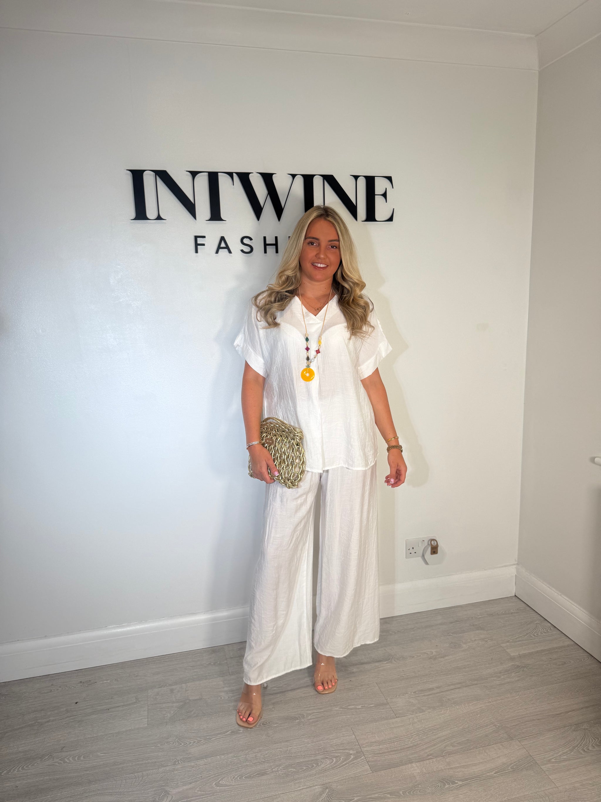 Conjunto de pantalón y top Natasha con collar