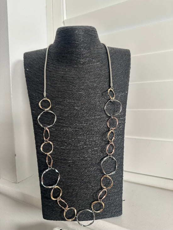 NATASHA CIRCLE RINGED LONG NECKLACE as worn with Kerry dress