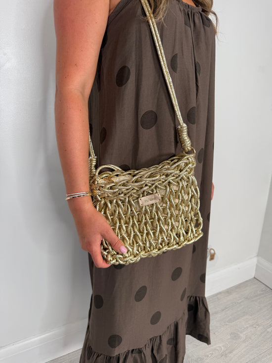 Metallic bag with clip on strap
