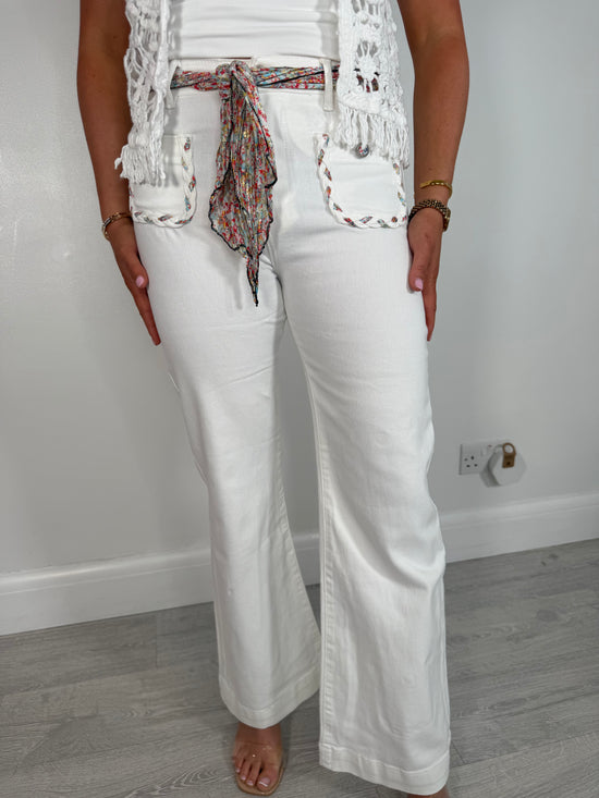 Candice white flared stretch jeans with pocket detailing and scarf belt